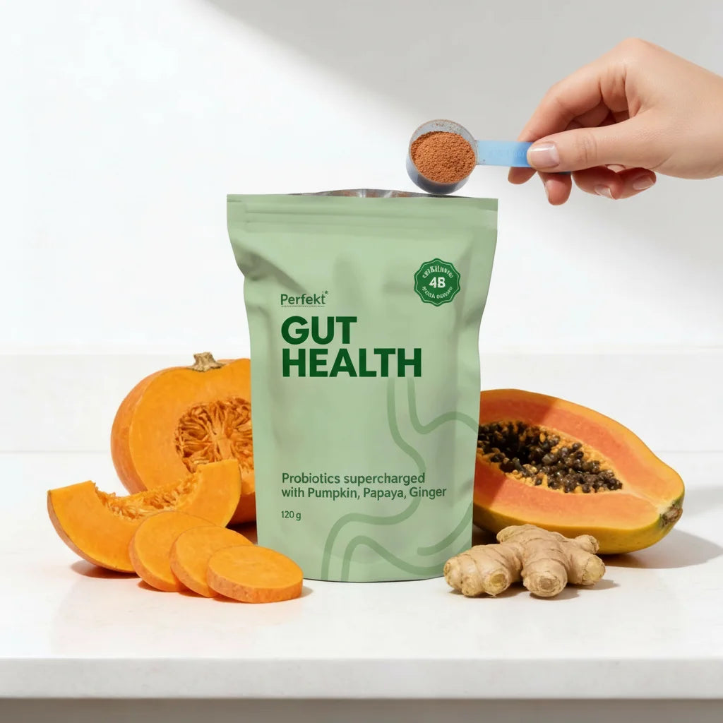 Perfekt Gut Health package with pumpkin, papaya, and ginger on a white background